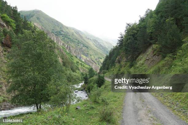 road to the russia/georgia chechen border in the argun river valley - argenberg stock pictures, royalty-free photos & images