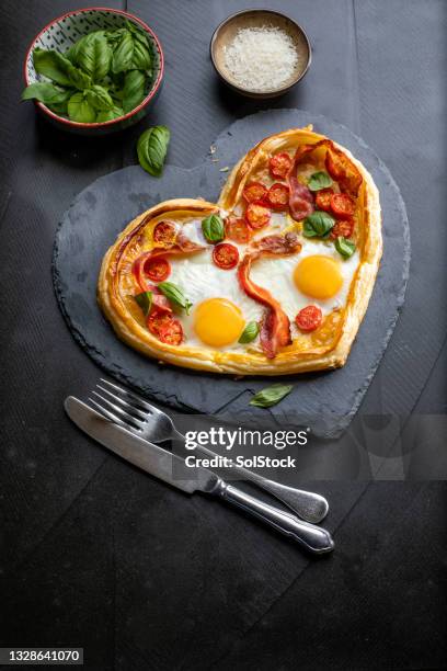 breakfast pizza - heart shape pizza stock pictures, royalty-free photos & images