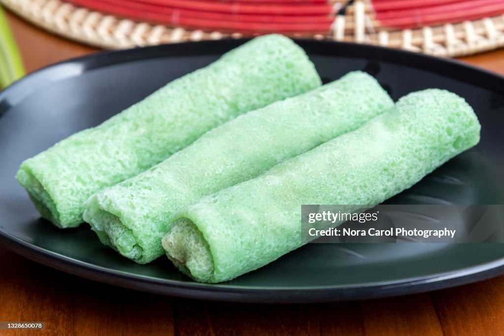 Kuih Dadar Or Ketayap - Rolled Crepe Filled with Grated Coconut and Palm Sugar