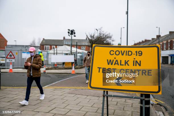 the testing centre is here! - moving past covid stock pictures, royalty-free photos & images