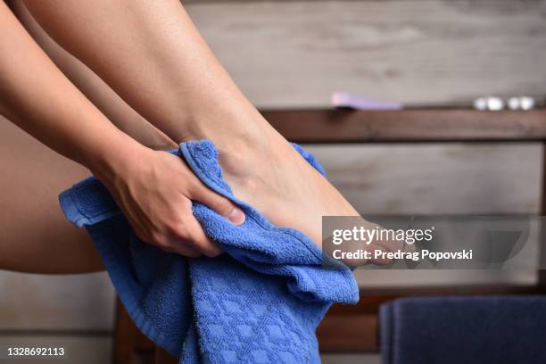 female foot and towel after spa treatment - towel stock pictures, royalty-free photos & images