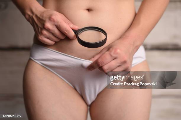 gynecologic evaluation concept - genitalien stockfoto's en -beelden