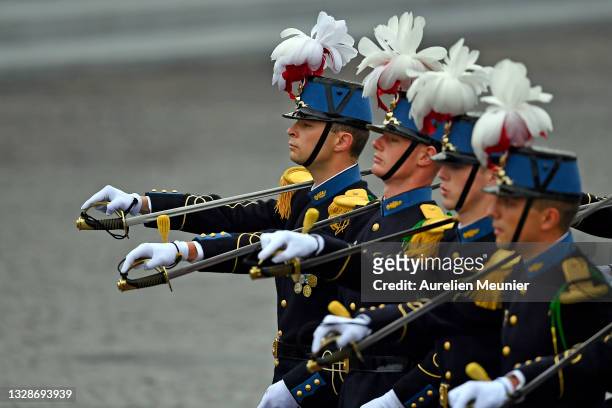 French national military Saint Cyr Coetquidan academy cadets march during Bastille Day Military parade on July 14, 2021 in Paris, France. This year...