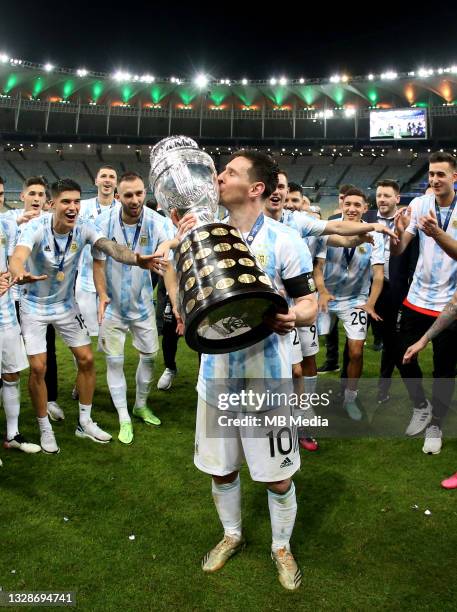 Lionel Messi of Argentina lift and kiss the Conmebol Copa America Trophy after winning the Final of Copa America Brazil 2021 ,during the Final Match...