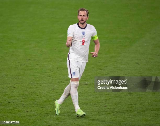 Harry Kane of England celebrates scoring his penalty during the shoot out of the UEFA Euro 2020 Championship Final between Italy and England at...