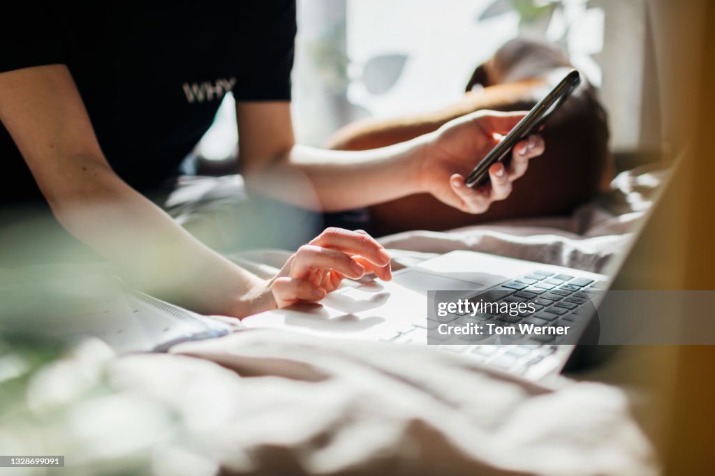 Teenage Girl Logging Into Zoom Class To Study From Home