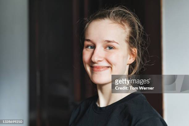 portrait of teenage girl smiling - german girl alone stock pictures, royalty-free photos & images