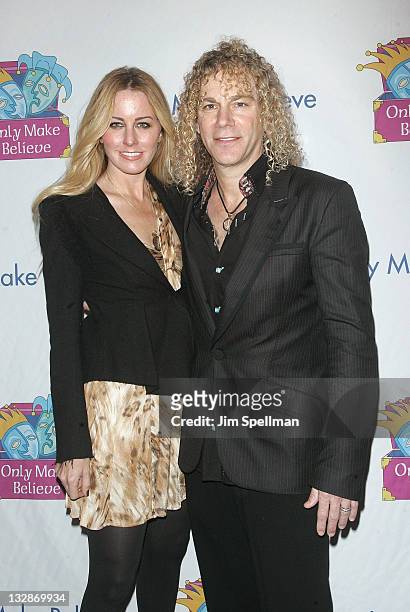 David Bryan and guest attend the 12th Annual Make Believe on Broadway gala at the Shubert Theatre on November 14, 2011 in New York City.