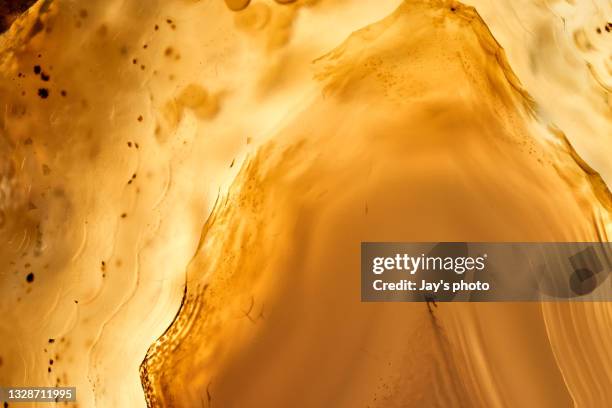 close up shot of mineral crystal photo, background, texture.blue. - bernstein stock-fotos und bilder