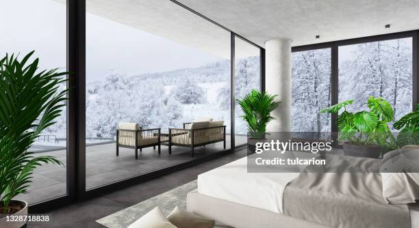 luxury hotel modern interior bedroom with large windows. winter scene mountain forest.. - luxury property bildbanksfoton och bilder