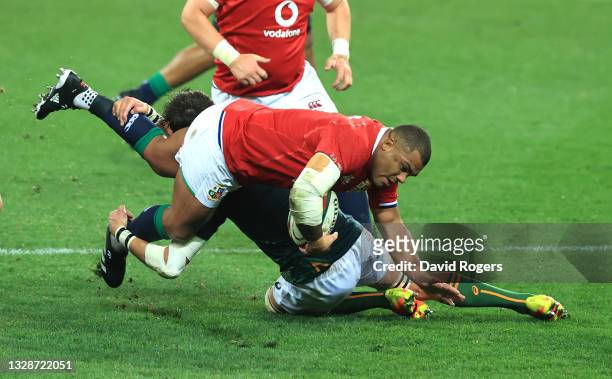 British & Irish Lions front row Kyle Sinckler is tackled by Franco Mostert of South Africa A during the match between South Africa A and the British...