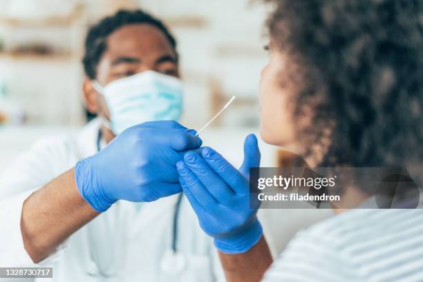 coronavirus nasal swab test - coronavirus test stock pictures, royalty-free photos & images