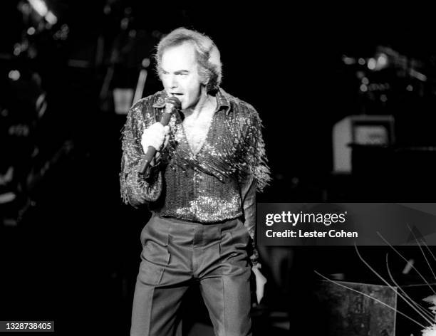 American singer-songwriter and actor Neil Diamond sings during a concert at the Greek Theatre circa August, 1986 in Los Angeles, California.