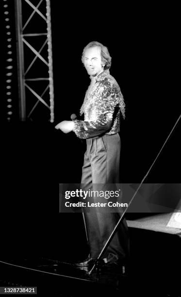 American singer-songwriter and actor Neil Diamond sings during a concert at the Greek Theatre circa August, 1986 in Los Angeles, California.