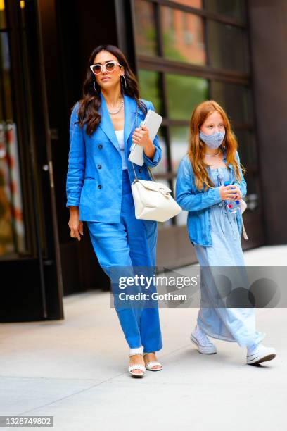 Jessica Alba exits an office building with her daughter Haven on July 14, 2021 in New York City.