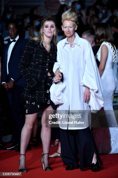 Honor Swinton Byrne and Tilda Swinton attend the "Les Olympiades " screening during the 74th annual Cannes Film Festival on July 14, 2021 in Cannes,...