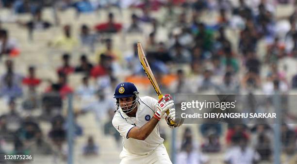 Indian cricketer V.V.S. Laxman plays a shot during the second day of the second Test match between Indian and West Indies at the Eden Gardens in...