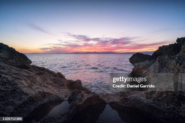 a sunset in mallorca - inselgruppe balearen stock-fotos und bilder