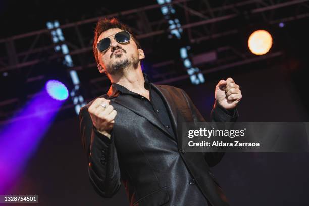 Spanish singer and guitarist Coque Malla performs on stage at 'Noches del Botanico' music festival at Real Jardín Botánico Alfonso XIII on July 14,...