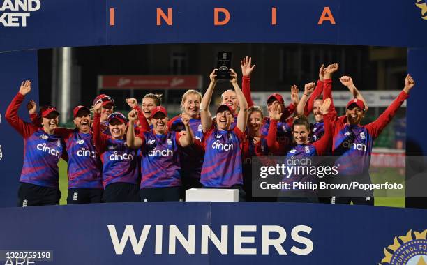 Heather Knight of England holds up the series trophy after the 3rd Women's T20 International between England and India at Cloudfm County Ground on...