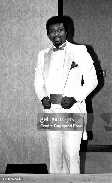 Singer Dennis Edwards poses for photos backstage at the Holiday Star Theatre in Merrillville, Indiana in 1984.