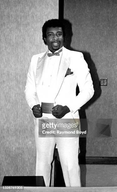 Singer Dennis Edwards poses for photos backstage at the Holiday Star Theatre in Merrillville, Indiana in 1984.