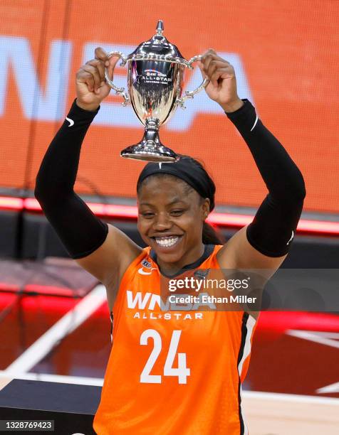 Arike Ogunbowale of Team WNBA holds up the MVP trophy after the 2021 WNBA All-Star Game at Michelob ULTRA Arena on July 14, 2021 in Las Vegas,...