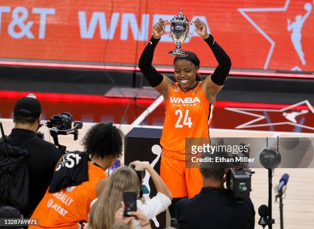 Arike Ogunbowale of Team WNBA holds up the MVP trophy after the 2021 WNBA All-Star Game at Michelob ULTRA Arena on July 14, 2021 in Las Vegas,...