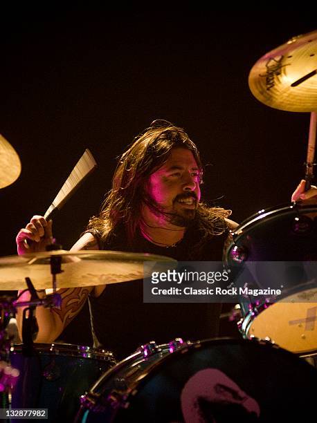Dave Grohl of American rock band Them Crooked Vultures, live on stage at the Hammersmith Apollo, December 17 Hammersmith. Also famous for being in...