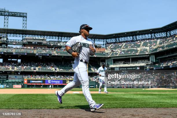 Jasson Dominguez of American League Futures Team returns to the dugout after playing defense against the National League Futures Team at Coors Field...