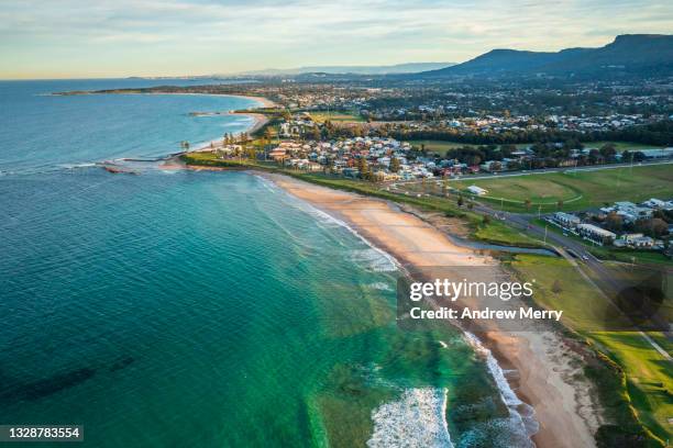 sea coast beach town, mountain range, aerial view, australia - wollongong stock pictures, royalty-free photos & images