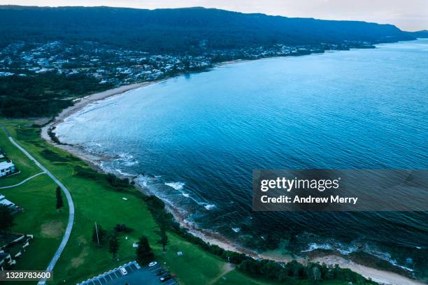 bay of blue water, sea, beach and mountain - wollongong stock pictures, royalty-free photos & images