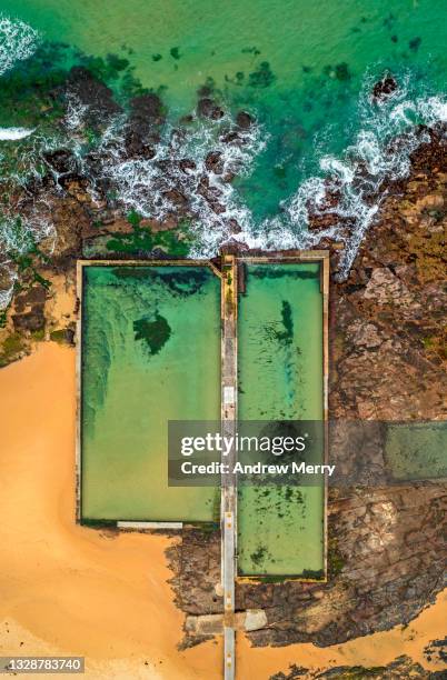 ocean swimming pool, sandy beach, rocky coastline, aerial view, australia - wollongong stock pictures, royalty-free photos & images
