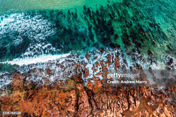 waves on rocky coastline aerial view, australia - sydney from above stock pictures, royalty-free photos & images