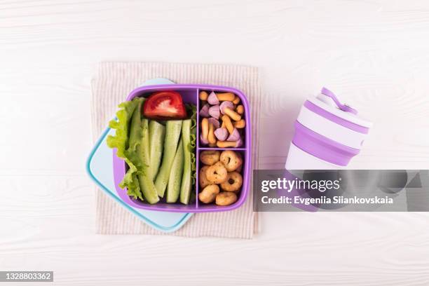 lunch box with fresh vegetables and snacks on wooden table. - drinks flask stock pictures, royalty-free photos & images