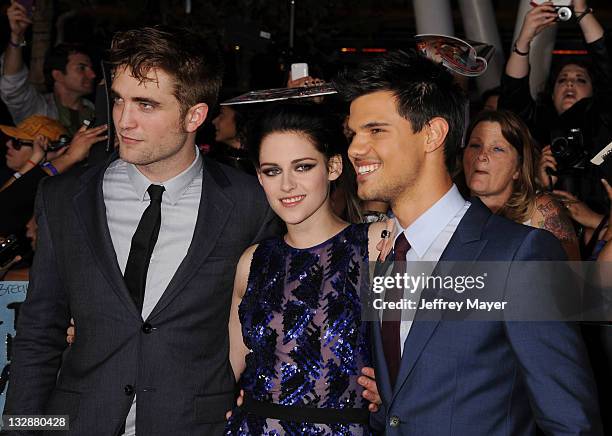 Robert Pattinson, Actress, Kristen Stewart and Taylor Lautner attend "The Twilight Saga: Breaking Dawn Part 1" at Nokia Theatre L.A. Live on November...