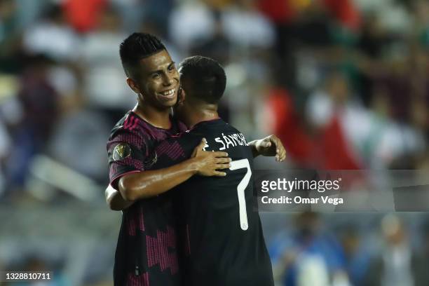 Efraín Álvarez of Mexico and Erick Sánchez celebrates during a Group A match between Guatemala and Mexico as part of 2021 CONCACAF Gold Cup at Cotton...