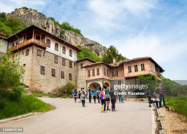 tourists in front of the transfiguration monastery near veliko tarnovo - bulgarians stock pictures, royalty-free photos & images