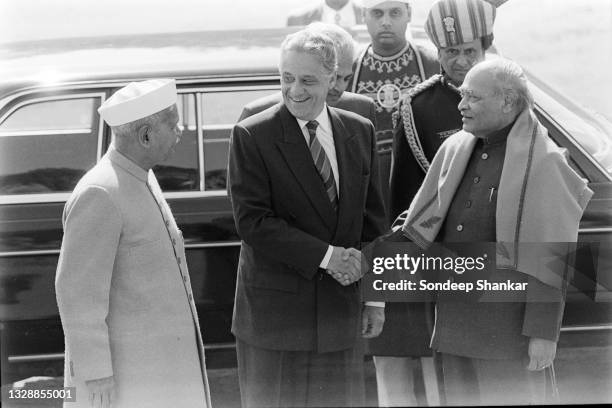 Indian Prime Minister PV Narsimha Rao greets President of Brazil Fernando Henrique Cardoso in the forecourt of the Presidential Palace, New Delhi on...