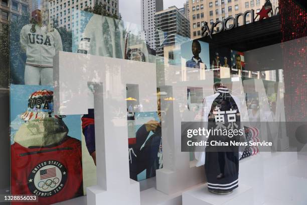 Ralph Lauren's Team USA uniforms for the Tokyo 2020 Olympics are displayed in the window of a Macy's department store on July 14, 2021 in New York...