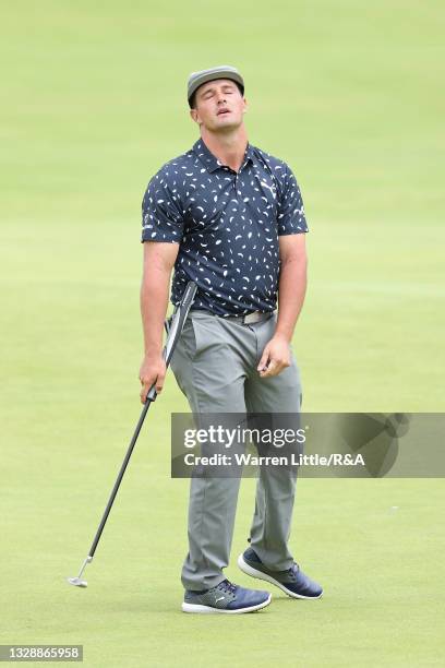 Bryson Dechambeau of The United States reacts to a missed putt on the 18th green during Day One of The 149th Open at Royal St George’s Golf Club on...