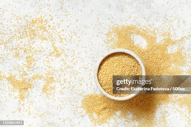 bowl of raw amaranth grain - amarant stock pictures, royalty-free photos & images