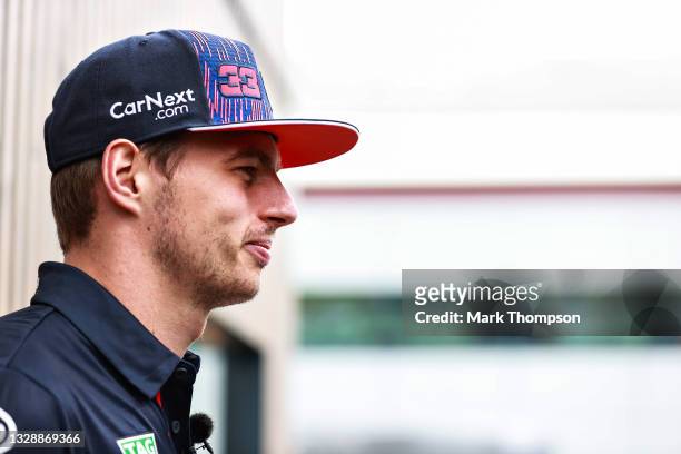 Max Verstappen of Netherlands and Red Bull Racing looks on in the Paddock during previews ahead of the F1 Grand Prix of Great Britain at Silverstone...