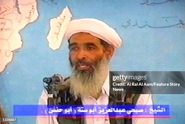 Abu Hafs, also known as Mohamed Atef, one of Osama bin Laden''s lieutenants, speaks in this undated still frame from a recruitment video for bin...
