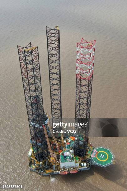 Self-elevating drilling platform, or jack-up drill rig, is seen at a shipyard of Cosco Shipyard Co., Ltd before being delivered to China Oilfield...