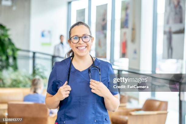 portrait of a working nurse - medical student stock pictures, royalty-free photos & images