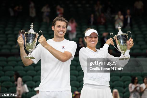 Neal Skupski of United Kingdom and Desirae Krawczyk of USA with the winners trophies after victory in the Mixed Doubles Final against Harriet Dart...