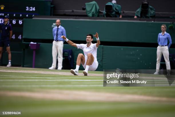 Novak Djokovic of Serbia celebrates the moment of victory during the Men's Singles Final against Matteo Berrettini of Italy at The Wimbledon Lawn...