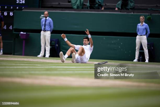 Novak Djokovic of Serbia celebrates the moment of victory during the Men's Singles Final against Matteo Berrettini of Italy at The Wimbledon Lawn...