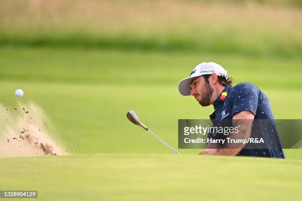 Benjamin Herbert of France plays from a bunker on the 11th hole during Day One of The 149th Open at Royal St George’s Golf Club on July 15, 2021 in...